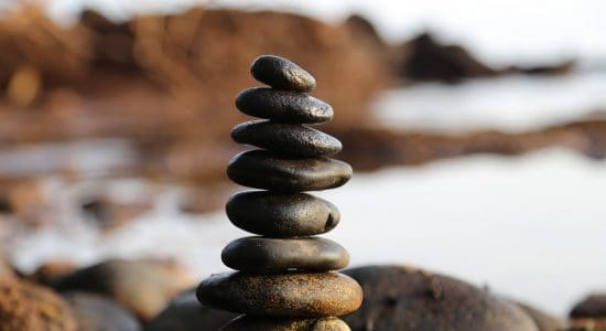 Image of a meditative stones representing meditation as part of Wessex Cancer Support services